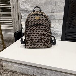 Michael Kors Black and Tan Logo Backpack